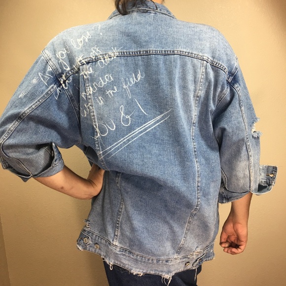 jean jacket with writing on back